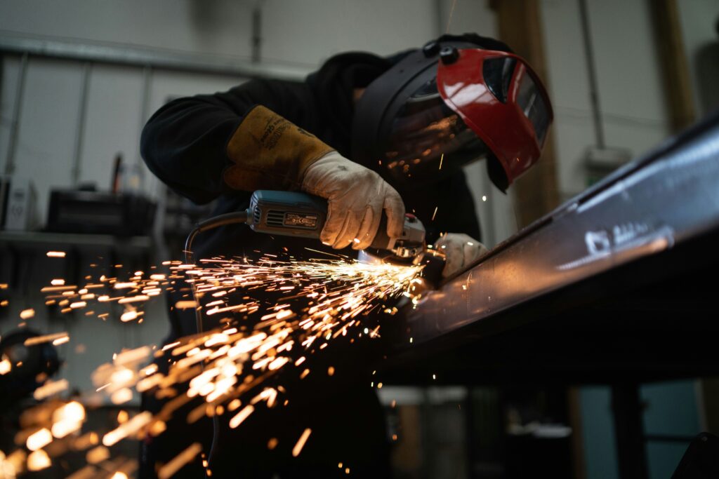 A man welding in a factory