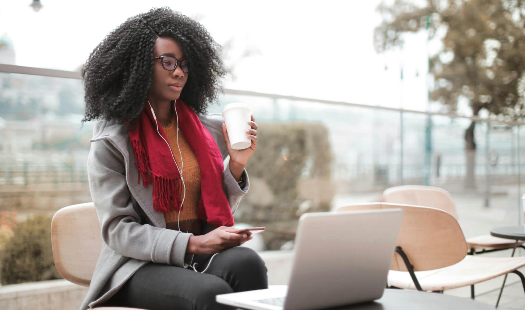Person working remotely at a cafe