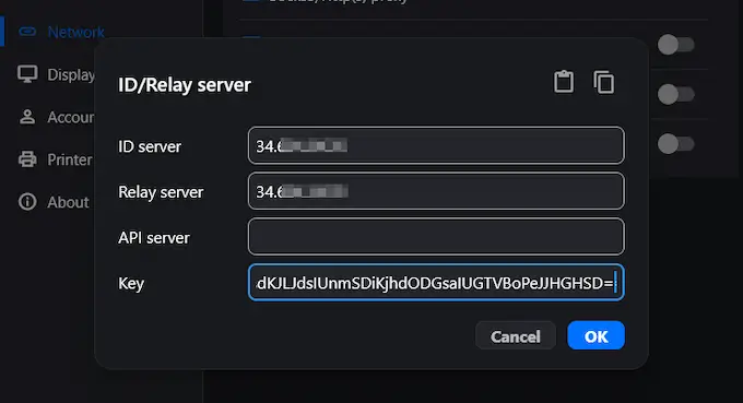 RustDesk client network settings page with ID/Relay server and access key